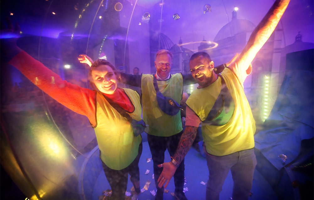 People posing in dome