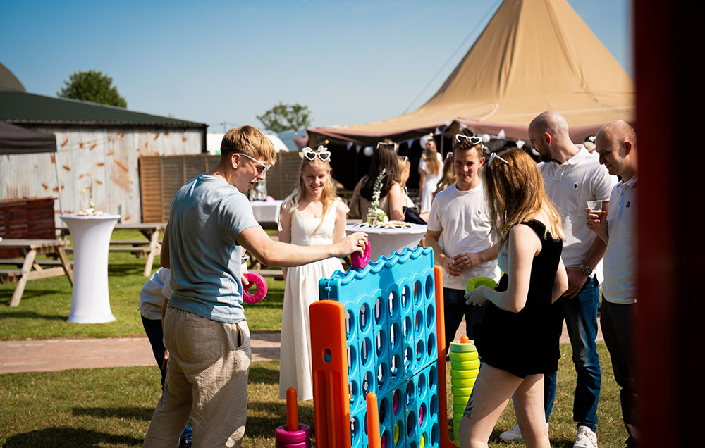 People playing connect 4.