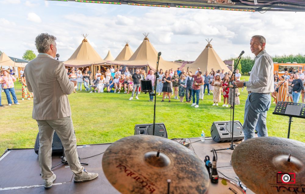 Band on stage bus at corporate festival