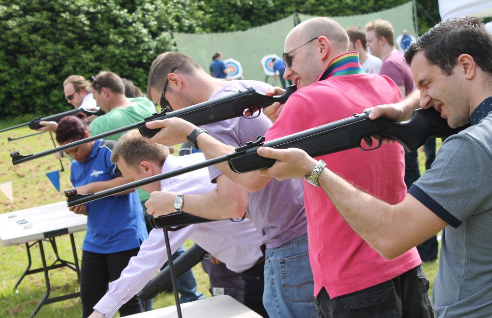 Team doing rifle shooting