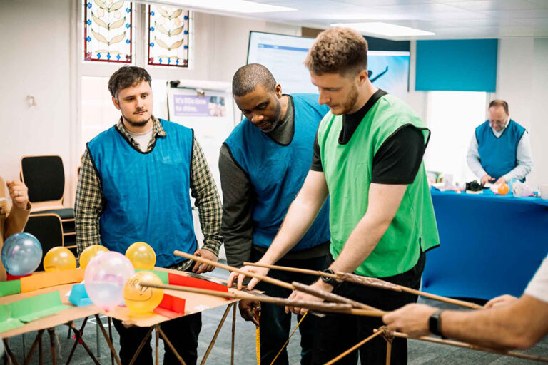 Men-buildimg-a-bridge