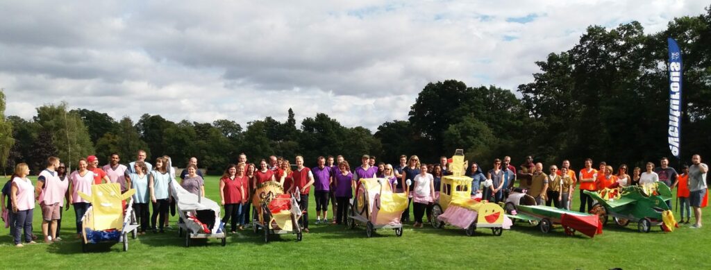 group of people in front of there soapboxs on our soapbox derby