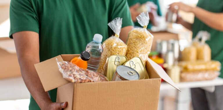 Person donating to foodbank