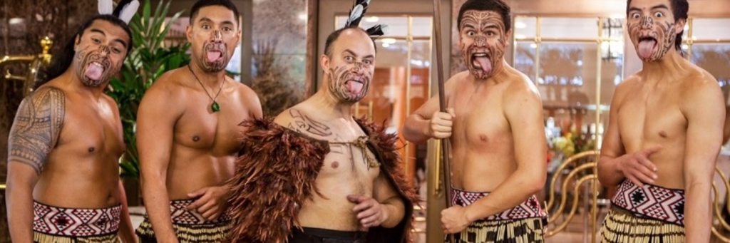 A group of people posing for the camera

Description automatically generated