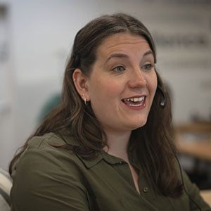 Woman smiling talking on the phone