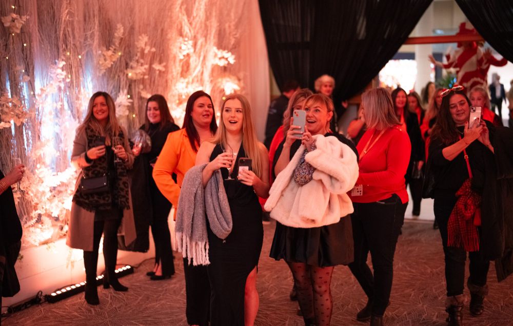 Attendees walking in