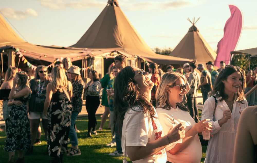 People laughing and having a good time at summer party