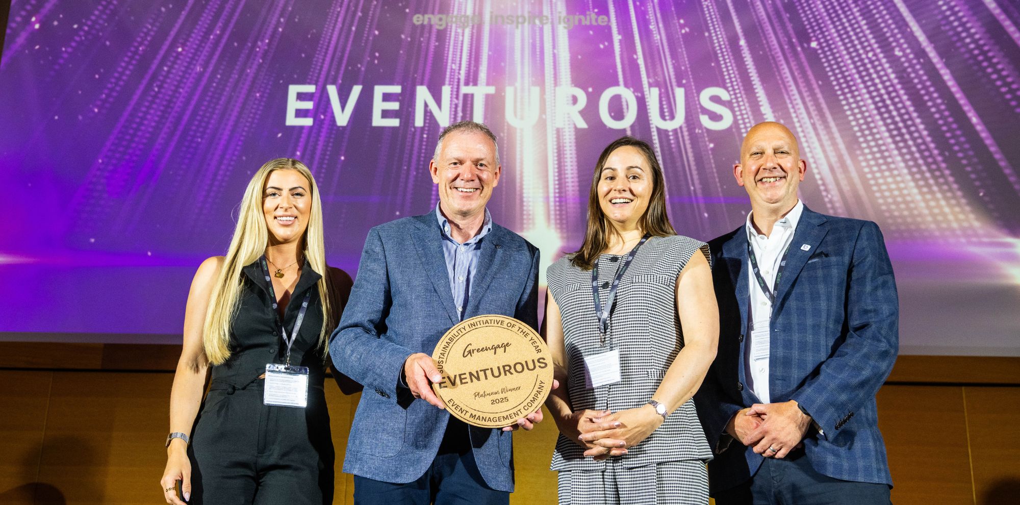 Eventurous team collecting award from CEO Greengage