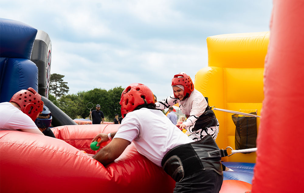 inflatable games in its a knockout team building game